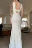 I think this dress is very pretty. It fits so well and hugged my curves. - Samantha T.