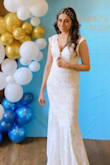 I wore this for my bridal shower and absolutely adored it! Definitely more on the fitted side and a bit long but perfect with heels. - Seher M.