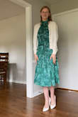 I've been searching for the perfect dress for a Spring wedding, and this is it!! Soft and feminine with a flirty open shoulder (not to mention the color is stunning). I also plan to wear this dress for Easter and pair it with a white cardigan. The only reason I didn't give 5 stars was the fabric near the tag was torn a bit. I don't have time to find another dress so I'm not returning, but I was disappointed considering the price. - Elizabeth B.