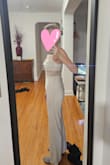 I never wear pantsuits or rompers, but I wanted this for one of my evenings out during my bachelorette weekend in NYC! I am a tall girl (5'10") with wide hips, and the length was perfect on me. The small fit well; sometimes, I have to size up to medium to avoid camel toe, but it was not necessary for this style. Can't wait to wear it out!! - Jacqueline P.