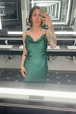 The dress is beautiful and feels well-made. The green looks accurate to the online images. Size-wise I tend to land between a M and L, so for this dress, I purposely ordered a L and had it altered, which I'm so glad I did. The length and bust were perfect, but the hips/waist area was loose so a little alternating helped adjust it to fit my curves better. Got lots of compliments as a wedding guest. (: - Amanda S.