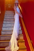 The small fits like a glove, but there is no stretch; be warned. I love the look with a hat and will braid my hair with extensions for my big day. Thanks for the gorgeous, affordable wedding dress. I plan to cut it off after and use it again. - Lenore L.