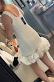 I absolutely LOVE this dress! I bought it for my bridal showers coming up and it fits perfectly and is very forgiving in the waist area due to the fabric/material it's made of. I was nervous it would be tight around my stomach but I got a size small and it looks so good and is super comfortable and cute! Very happy with my purchase :) - Madison K.