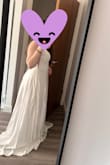I bought this dress and it fits perfectly. It looks better than in the picture. The quality is really good. However, for my height, I need to get it tailored for my big day. - Mariana B.