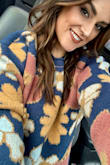 Wore this out to brunch and got so many compliments! Everyone asked where I got it and several of my friends immediately went to purchase it. It's roomy but cropped just enough to meet the top of my jeans. I purchased a Medium. - Jessica S.