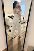 I am pretty happy with this jumpsuit! It's very classy. Fits a little snug in the shoulder/bust area for me personally, but I know a size L would be too big for all my other areas! Can't win 'em all, I guess. - Tina T.