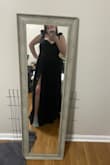 I love it. Most the reviews said it ran big it did not but its still perfect. It came with a rip on the top that I'm having to get sewed up hopefully it looks right. I bought this for prom so excited! P.S. the slit is a little high! I am having to get that sewn a little as well. - Savannah B.