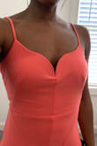 I was really hoping this dress was going to be the one. Unfortunately, it is not. The color is a beautiful coral/pink. It fits true to size, but I had to adjust the straps. I had to return because there is a line/hem that runs down the front of the dress, and it's unflattering and just looks weird. The split was also in a good place, so I really hate that the lines mess this dress up for me. - Naya J.