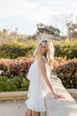 I absolutely loved this dress. It fit perfectly. I wore it for my engagement photos and it turned out so freaking good on camera and looks amazing in person. - Carli N.