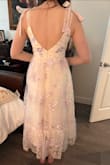This dress is absolutely beautiful. The details remind me of cherry blossoms. It combines my two favorite colors while still being bridal. I plan to wear this for my rehearsal dinner. Strapless sticky bra probably works best with this style. It's a tiny bit poofy looking depending on the angle, but overall it's so beautiful and will look great in pictures I'm sure. - Amanda S.