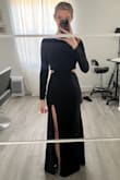 This dress is PERFECT! Finding the perfect fit can be tricky with my curves (140 pounds, 34 double D), but this dress nails it. It hugs every curve perfectly, and the material stretches, making it incredibly comfortable. The length is just right too. Highly recommend! - Jessica