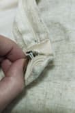 I really love the fabric and it was perfectly flowy. However- the hook closure is already loose and will need a few stitches to stay on, and the outer linen layer shrunk even in a cool temp wash. Be careful! - Anna K.