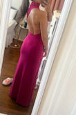 I originally ordered this dress in a S but I exchanged it for an XS. The cut is unique and the material is good quality. - Emma V.