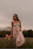 Bought this beautiful dress for my daughter's senior pictures! I couldn't be more happy. It's stunning! - Brandy P.