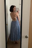 This dress is so cute!! The back is stunning and I love the length. I was a little worried that I wouldn't be able to wear it without a bra (I'm a 32DD and am more comfortable if I have some type of boob support), but I was able to adjust the strings in the back so my boobs were supported just fine! Plus, you get a lot of string to work with, so I wasn't worried about running out. Great dress! - Maria P.