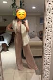 I've owned this jumpsuit for 5 years now. I bought it for a rehearsal dinner and have worn it to plenty of events and nights out since then - birthdays, theme parties, etc. It's super stretchy and comfortable for dancing and whatnot. The neckline is of course low-cut and somewhat wide, so at times, I have worn pasties or something else to keep my boobs in place. It's a great versatile fit! Size small has fit me well through different phases (in shape and not in shape) - Katherine Y.
