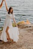 I wore this as one of my outfits for my engagement photoshoot, and it was perfect! I got so many compliments on the dress, and it was fun to have something to play with that our photographer brilliantly utilized for different poses. As with most white outfits, be careful what you wear underneath. I'd recommend it for any bridal event! - Allie S.