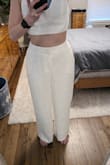 I ordered this outfit for my bachelorette party and my rehearsal dinner along with the top that matches. I have an athletic body type with minimal curves. I originally ordered a size small and it was a little too tight in the waist, perfect fit around my butt, and perfect length. I had a long debate with myself if I should exchange it for a medium. I ultimately wanted to comfortably breathe at my rehearsal dinner so I exchanged it for a size medium. The size medium fit perfectly in the waist, but now doesn't give me any shape and looks baggy. The material is worth the money! It's comfortable, soft, and seems durable. I love the quality, but disappointed in the fit. I am going to stick with the size medium and pay extra for alterations. I think if you have my waist size with some curves then this outfit should fit your perfectly. The pictures below are in a size medium. - Deanna R.