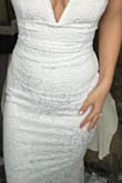 The dress was super comfortable and the train was a great length! The dress really made me feel like I had some shape when often times I feel like I don't have much of a figure. It felt very supportive for being strapless and low cut. I really wanted this to be the one! I couldn't quite figure out the wire in the top. If I pulled the dress up more, the wire would bulge out and not sit flush. if I pulled it lower it sat better on my body, but then I felt like my nipples were just barely getting covered. I wasn't able to get the amount of coverage I wanted on top without having to constantly hold the wire down on my body. Ultimately, I'm choosing another dress because I feel as though I would be too fixated on my chest area throughout the day. - Katelyn H.