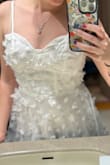 I absolutely adored the butterfly details even though I was a bit skeptical about them when I ordered, but they're so well-made and pictures don't do justice to how lovely they are in person. I didn't end up keeping the dress cause I thought it hit me at a weird point on my waist, and it wasn't flattering enough. But the back and straps are adjustable and if you have the right body type for this dress, it's stunning! - Elaine S.