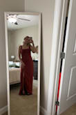 The dress is nice, but the color is a little darker in person. It was a little big in the chest, and beware- the slit goes all the way up to your waist! You could easily and accidentally expose yourself!! - Camille F.