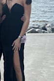 I loved this dress so much! It came so fast, and it arrived in perfect condition. the material was perfect for a school dance, and the top stayed up pretty well! No problems with zipper or anything. :) - Meredith O.