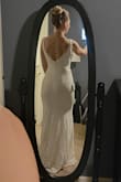 My first order from Lulus was wonderful. I ordered 5 wedding dresses after getting home from boutique shopping. I was nervous about the fit and quality when ordering online and actually the fit me wonderfully for much less and no need for alterations. Yes, there isn't as much structure to some of the dresses (boning, stays and lining) compared to a $1000 dress but they are nice fabric, FIT me PERFECTLY, and so worth the money I'll save. This dress was my favorite of the 5. I'm very happy with my Lulu's order! I wish the lace matched on each side of the v-neck. - Ashley D.
