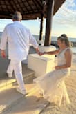 Wore this for our 25 year vow renewal. Dress is made well and was a perfect fit for me. Comfortable, somewhat heavy. Had the length hemmed. - Lisa L.
