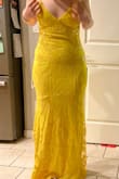 I bought this dress with a few others and loved it. Good price and looks like the photos. - Marquessa N.