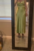 Bought this for a wedding I'm going to in May and it's perfect! The material is very high quality and feels nice on my skin, the back is stunning and in the right position where I can wear a regular strapless bra. The color is beautiful. I could not have asked for a better dress. - Hannah C.