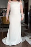 This dress was not at all flattering and was SO TIGHT in the arm area. The off shoulder style was not it for this one. Also, it runs very small so size up at least one size, maybe even 2 if you want to be comfortable - Sofia N.