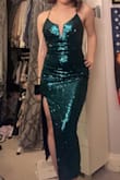 This dress is amazing! It fits true to size and is very flattering. The straps in the back were also very easy to figure out. If you're super short, like me, this dress is a perfect fit. :) - Sarah O.
