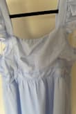The dress is very poorly made. The seams pull. The dress looks very poor quality. In fact, you can see it in the front photo on the website. However, it is much worse in reality. - MARIA B.