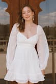 I bought this dress for my graduation pictures, and it was so cute and fit like a glove! I was worried it would be too short on me since I have a long torso, but it was fine (I just wore spandex underneath just in case) - Lindsy C.