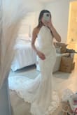 Ordered this dress as a back up and& I AM DEF wearing this one instead! Just wow! I'm wearing this for my beach elopement. The only complaint I have is the bottom portion is a little loose for me so I will try to see if I can get that altered. Other than that, the neck portion fit me just fine along with the waist area. Def can't wear a bra with this as it is backless but that's the best part of the dress! I can't wait to wear this dress on my special day! Def can't beat the price too! - Destiny H.