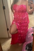 This dress is so light weight and perfect. It stays up good because it has sticky part on the top. - Lilly F.
