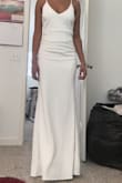 fit nicely, was concerned it was going to be tight but it had a little room on the waist. a little thick, not see through. I wish it was a little shorter, I'm 5'5 was wearing heels and it was touching the ground. - Emma H.