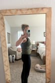 I am usually between small and medium or a 4 and a 6. I went with the medium because I didn't want it to be too tight. It's still tight; I think I'm too busty for it. There is a layer of fabric under that just doesn't sit right on my boobs. It also kind of gapes open on the side by my arms. I do like the color though. - Alissa S.