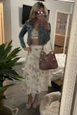 This is a beautifully made dress. I love it so much! The print and details are gorgeous in person. Just note there is little to no stretch in the top. I love that the straps are adjustable. 5 Stars all the way. - Lindsay C.