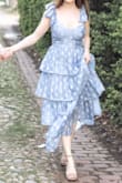 I ordered this dress for an engagement photo shoot and it was stunning! I received sooo many compliments from strangers during our photoshoot session (we strolled around streets in my city). The bust shape area looked a bit small on me since I do have a larger bust for my size, but it didn't ruin the look of the dress. - Morgan S.