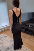 It is great quality, very well made and looks beautiful. It fits good and the length is perfect for me (because i will be wearing only 2.5 inches heels). It is a little tight on my butt and a little loose on my waist, but the material is very stretchy so the tight part isn't uncomfortable. I did go see a seamstress to reduce at the waist (really just a little bit), so it fits perfect, since i will be a bridesmaid. But on the pictures it is as I received it and it is not bad at all. Overall very happy, its going to be stunning! - Marie B.