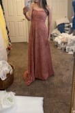 I love it so much! It's so flattering and holds my breast very nicely. They arent going anywhere. If you're short like me lol, you might have to get the bottom hemmed. I did because it was too long, but it's personal preference. So so pretty. Dusty Rose is perfect for the tan girlies. Love it! Definitely recommend! - Kaylee K.