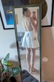 Such a cute dress! The fabric is a good quality and has a lining underneath so it's not see through. Some people might feel like it's too short, but I have long legs and I'm used to dresses being short on me. I love this dress and will be wearing it for my engagement party. - Kelsey B.