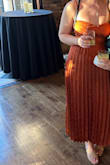 This dress was great for two weddings I attended (fall and winter)! I love the burnt orange color, and the dress fits comfortably for all-day wear. After 2 washes, the material is looking a little worn, but that's probably my fault. - Kristen B.