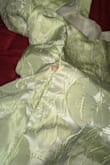 The dress style, color, and shape are beautiful; I loved this dress. The fit was amazing. However, the dress already has a hole, and the seam already looks all ripped from the front. Not recommended. - Lara I.