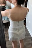 Absolutely love the movement of the fringe! So much fun for my wedding welcome party. I will need to wear shorts underneath as it is a tad short in the back and we will be bowling! - Madi R.