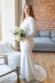 I loved this dress! I was looking for a long sleeve wedding dress for my elopement because we did it during the winter. The dress was good quality and thick material so it was not see through. It looked beautiful! The only issue I had was it tended to fold so I had to straighten out/adjust the dress for the photos. But other than that it was a 10/10! - Emma W.
