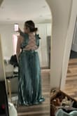 Dress was exactly as pictured. I'm a little short but have a really big chest. The XL was perfect! I originally ordered the L and the chest was too tight and the dress BARELY zipped. I do wish the piece of fabric under the bust fell more on my hips than under my chest but it's still gorgeous - Alyssa L.