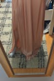 The material was far from what the picture showed, the dress was HUGE and I'm usually a 2-4 but I would definitely size down, the strap came broken and the color of the dress was no where near the same as the picture. I was surprised because when I ordered with Lulu's in the past it was great! - Clara R.