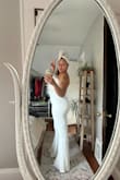 This jumpsuit is super cute! Nice and sturdy material with the perfect amount of stretch. Just gave it 4 stars because there is quite a wide gap between the bands of feathers that is quite hard to see on the images online. Still very very cute but not fully covered top in feathers. Very excited to wear this to my dress rehearsal! - Xaxona M.